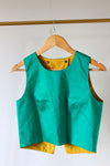 LE CROP TOP REVERSIBLE NANDI BICOLORE JAUNE/VERT