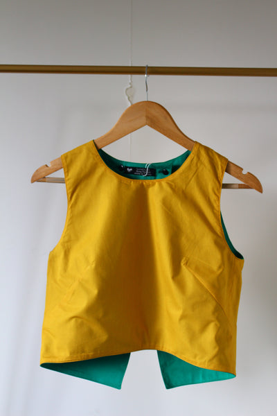 LE CROP TOP REVERSIBLE NANDI BICOLORE JAUNE/VERT